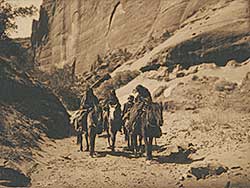 #207 ~ Curtis - Three Mounted Navajo Women and Child on Horseback